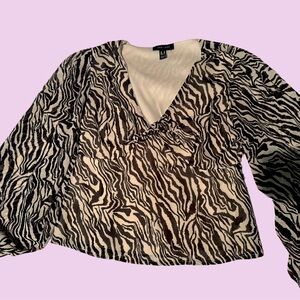 Long-sleeved animal print blouse